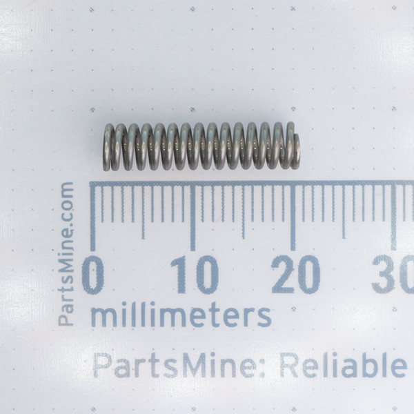 Century Spring NN-89CS compression spring measured against a millimeter ruler.