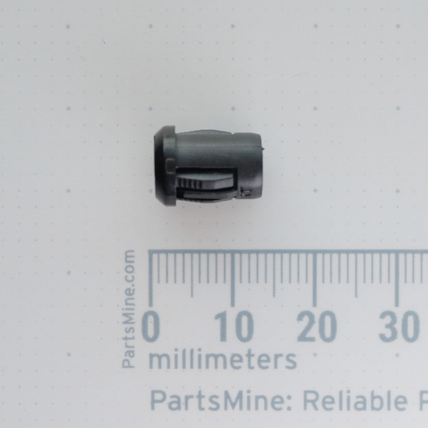 Side profile view of PartsMine A-775 LED clip next to a millimeter scale.