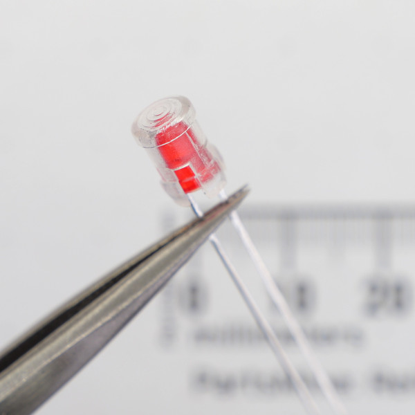 PartsMine A-6580 clear clip mounted onto a red LED.