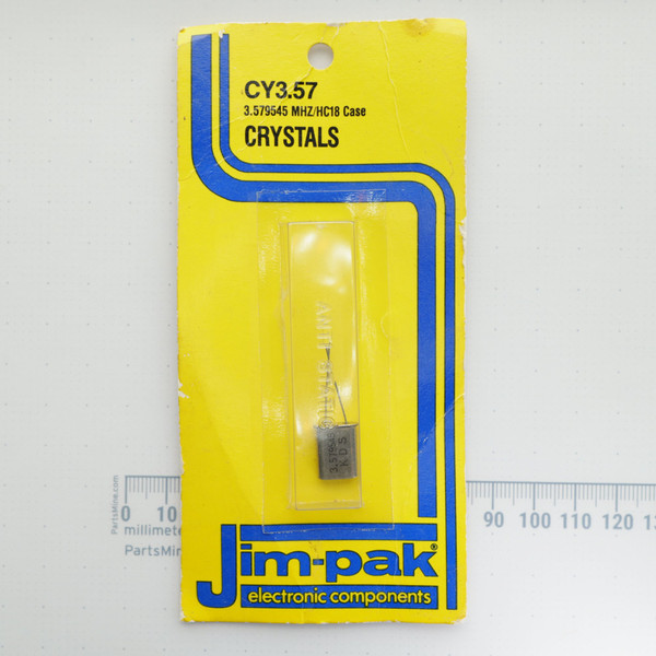 Jim-pak CY3.57 crystal in original retail blister card packaging.