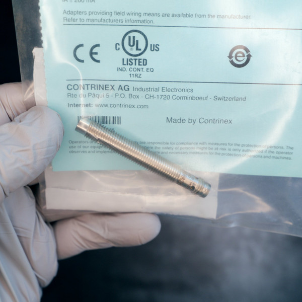Contrinex DW-AS-713-M8-001 threaded barrel inductive proximity sensor.