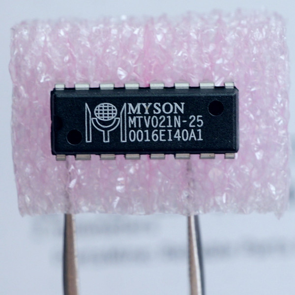 Top markings on a MYSON MTV021N-25 integrated circuit resting in pink foam.