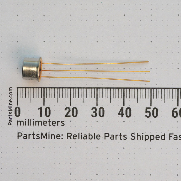 GE 2N491 transistor with gold-plated leads shown next to a millimeter scale.