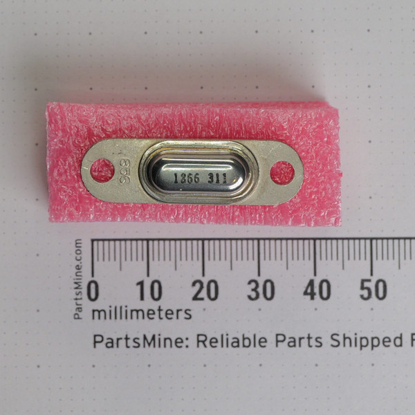 Hewlett-Packard 1866-0311 metal-can component in pink foam beside a millimeter ruler.