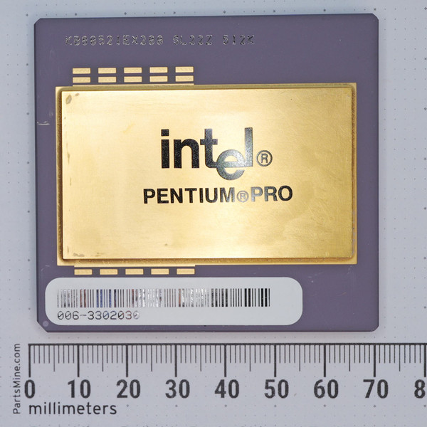 Top view of Intel Pentium Pro KB80521EX200 SL22Z 512K ceramic CPU against a millimeter ruler.