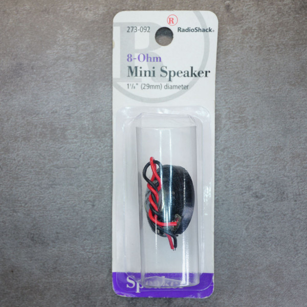 RadioShack 273-092 8-ohm mini speaker in original carded blister packaging.
