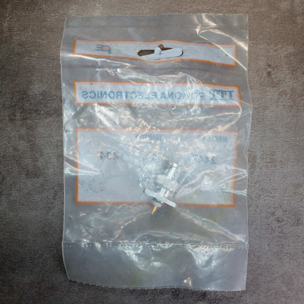 Rear view of sealed bag for ITT Pomona 2447 BNC male connector.