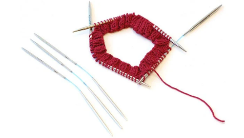 A set of 3 flexiflip knitting needles with a picture of the needles in use