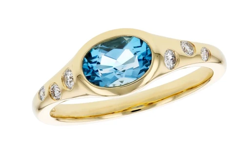 Blue Topaz and Scattered Diamond Ring