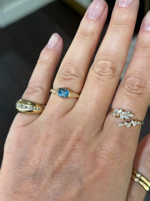 Blue Topaz and Scattered Diamond Ring