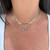 Emerald and Diamond Halo Necklace