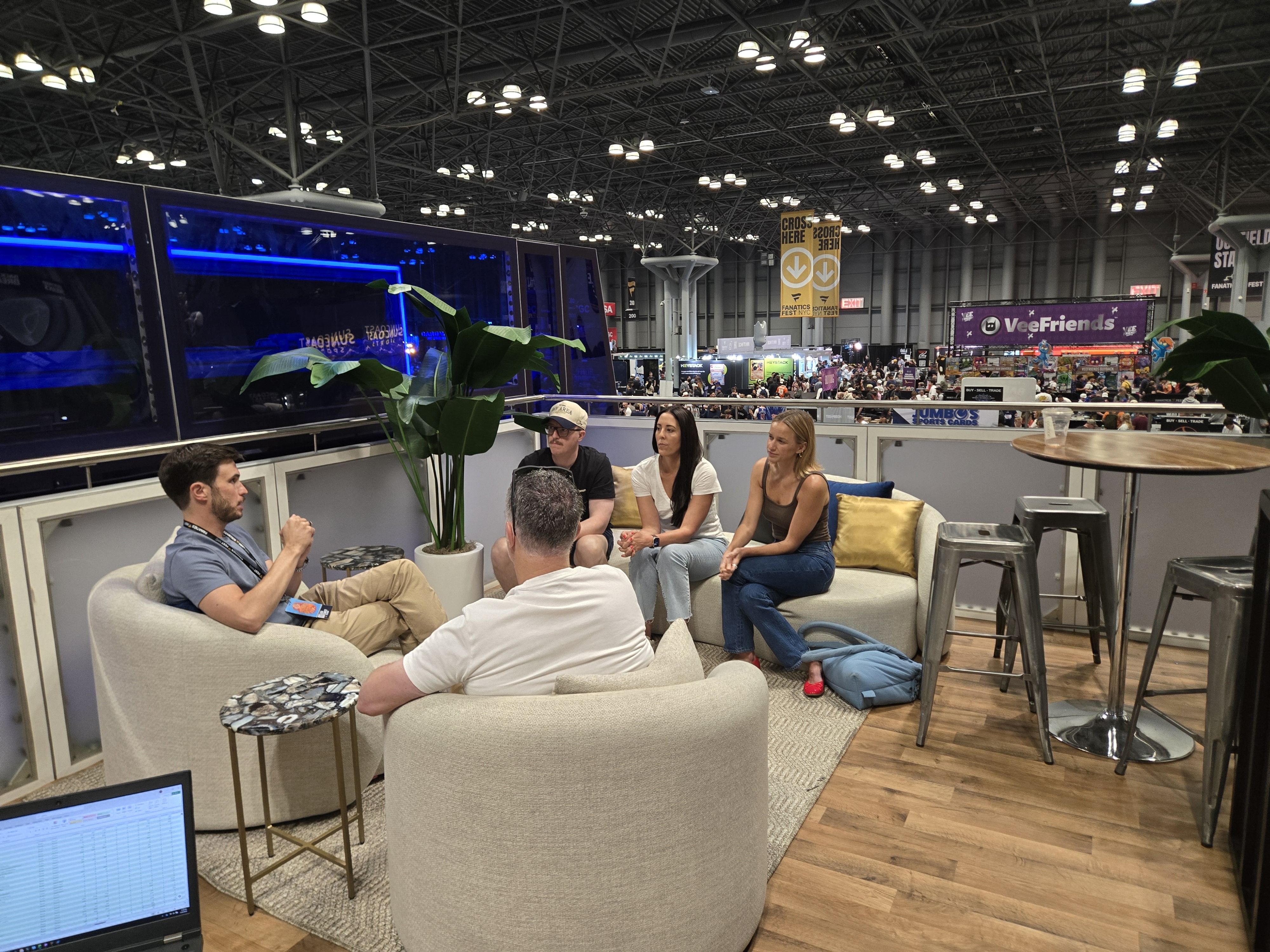 WeTheHobby trade show booth trading tables and fan activation area at Fanatics Fest