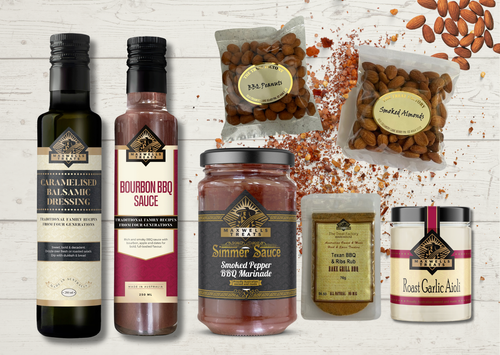 Fire & Feast BBQ Hamper with Maxwell’s Treats BBQ sauce, smoky marinade, balsamic dressing, garlic aioli, BBQ rub, smoked almonds and BBQ peanuts.
