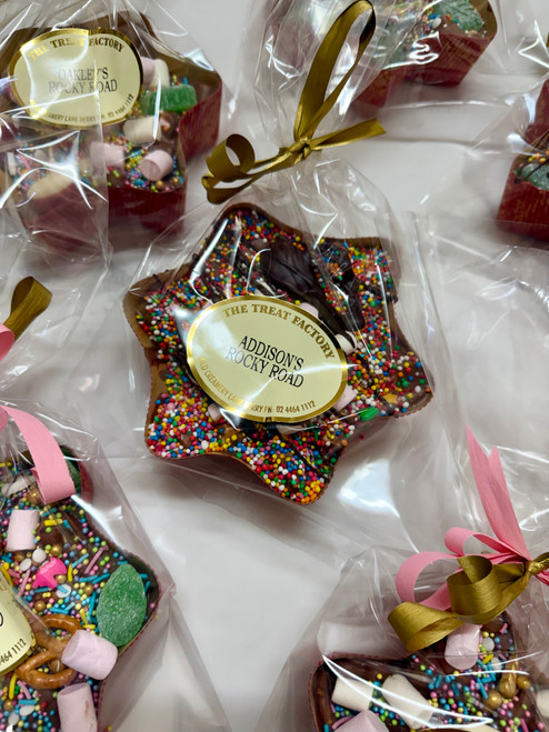 Finished handmade rocky road in a gift bag with a personalised label and ribbon, created during The Treat Factory's DIY Rocky Road Experience in Berry NSW.