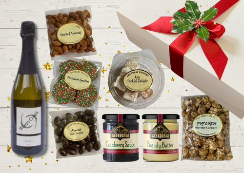 Christmas Bubbles and Treats Gift Hamper with Wileys Creek Silos Bubbles, cranberry sauce, brandy butter, Turkish Delight, Christmas Speckles, chocolate almonds, smoked almonds and caramel popcorn.