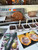 Cocoa pods growing on a cacao farm, a tasting of different chocolate varieties and the interactive chocolate flavour wheel during The Treat Factory's DIY Rocky Road Experience in Berry NSW.