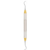 A.Titan - Posterior McCall Curette. Slightly angled curved broad blade. Excellent for distals of 2nd and 3rd molars. D Lite Handle