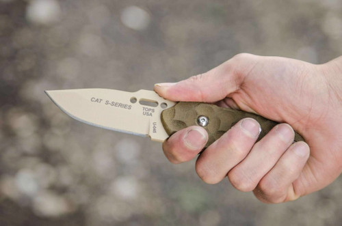 TOPS Knives C.A.T., 200S-04 - Hunter Point - Coyote Tan Blade - Green Canvas Micarta Rocky Mountain Bulls-eye Scales TOPS Knives C.A.T., 200S-04 - Hunter Point - Coyote Tan Blade - Green Canvas Micarta Rocky Mountain Bulls-eye Scales