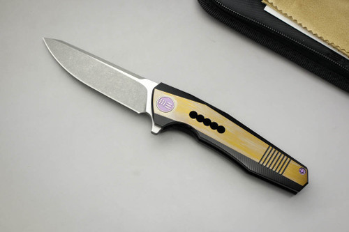WE Knife Company 603B - Frame Lock - Black / Gold Titanium