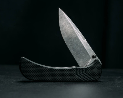 Half Face Blades - Cav Folder - Black G10, Magnacut, Textured Grip, TI Frame