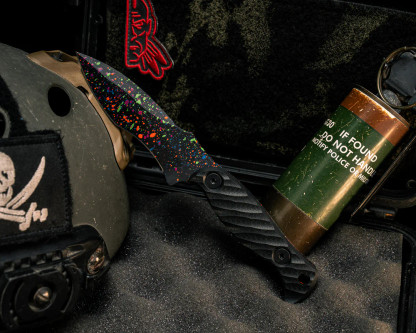 Half Face Blades - Extremis MK1 - Black G10, 80's RAD Splatter Cerakote, Allen Bolts, Hollow Lanyard Hole, Textured Grip