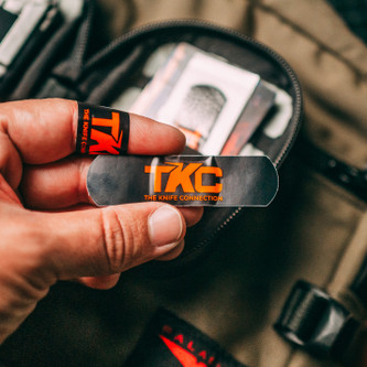 TKC: Band-Aids - 50 Pack of Band-Aids - Black & Orange TKC: Band-Aids - 50 Pack of Band-Aids - Black & Orange