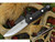Bark River Knives: Bushcrafter (Smooth Spine) Fixed Blade Knife w/ Black Canvas Micarta Handle & Red Liners