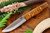 Bark River Knives: Bushcrafter II (2) Fixed Blade Knife w/ Dark Curly Maple Handle - Red Liners - Mosaic Pins - 1