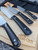 LT Wright Knives Cookcraft Collection Four Piece Knife Set w/ Bag and Board - AEB-L Steel - Flat Grind - Black Canvas Micarta w/ White Liners - Polished Finish