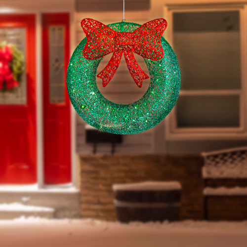 24" LED Lighted Green Glitter Wreath with Red Bow Outdoor Christmas Decoration