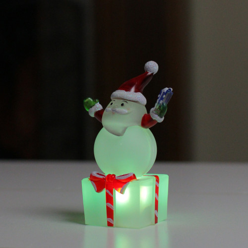 4" LED Lighted Color Changing Santa with Present Christmas Table Top Decoration