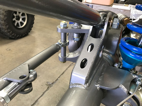 Axle side bracket welded on the axle tube in the proper location Axle side bracket welded on the axle tube in the proper location