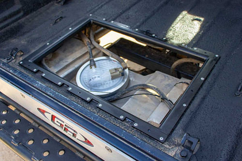 GenRight's fuel tank access plate is cut into the rear floor section of a Jeep LJ GenRight's fuel tank access plate is cut into the rear floor section of a Jeep LJ
