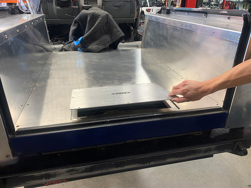 Integrated fuel pump access panel into new cargo area floor