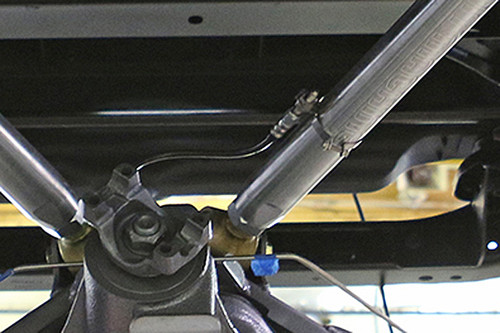 Close up of clamp on the upper control arm