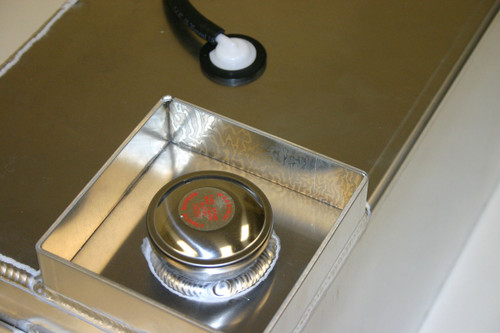 Close up view of gas cap and "dam" to prevent damage or spillage Close up view of gas cap and "dam" to prevent damage or spillage