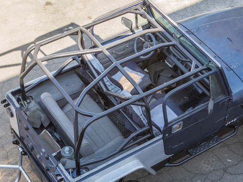 YJ Full Roll Cage Kit Shown with Optional Harness and X Bars YJ Full Roll Cage Kit Shown with Optional Harness and X Bars