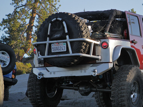 GenRight Off Road's Swing Out Rear Tire Carrier Shown with a 40" Goodyear MT/R and optional bag. GenRight Off Road's Swing Out Rear Tire Carrier Shown with a 40" Goodyear MT/R and optional bag.
