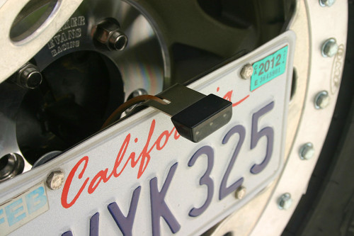 Small LED light mounts cleanly to license plate on our center mount Small LED light mounts cleanly to license plate on our center mount