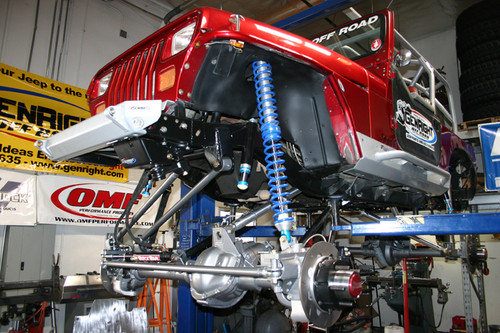 Allows you to run long out board mounted coil over shocks. Allows you to run long out board mounted coil over shocks.