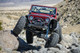 Tony testing the Tracer suspension in a 100% built GenRight Jeep LJ at the Hammers