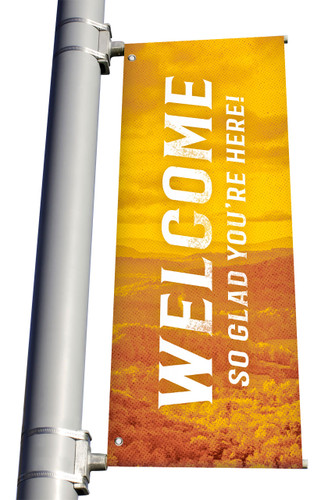 yellow Welcome so glad you're here light pole banner for fall harvest season