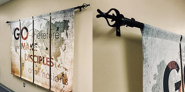 Fabric church banner hanging from a rod through its pole pocket