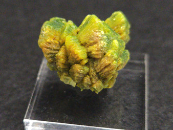 4.6 Autunite Crystal on display under indoor light