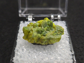 3.6 Gram Autunite Crystal in Perky Box  under indoor light