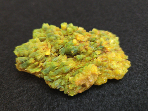 Lamellar Autunite Crystal - Fluorescent Uranium Ore, 25 Grams under indoor light