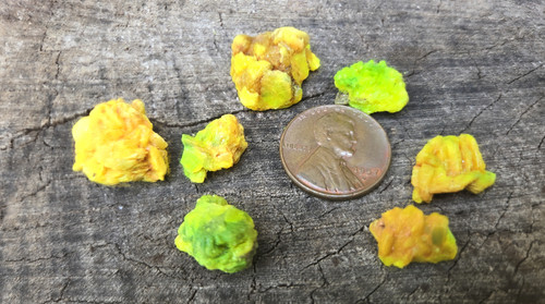 7 Piece Autunite Lot under outdoor light demonstrating daytime fluorescence
