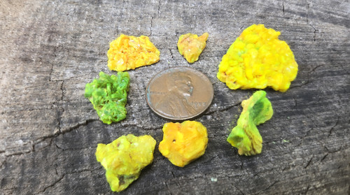 7 Piece Autunite Lot under outdoor light demonstrating daytime fluorescence