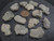 13-piece Trinitite lot - 30 grams size comparison to copper penny top side