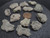 13-piece Trinitite lot - 30 grams size comparison to copper penny bottom side